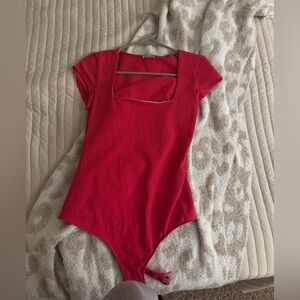 pink free people bodysuit